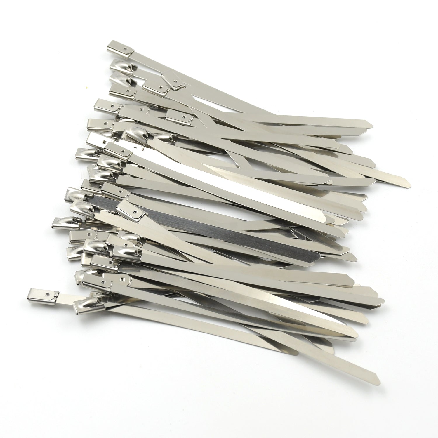 An array of durable stainless steel cable ties laid out, highlighting their uniform design and quality.