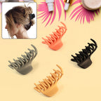 Matte hair claw clip securing hair in place