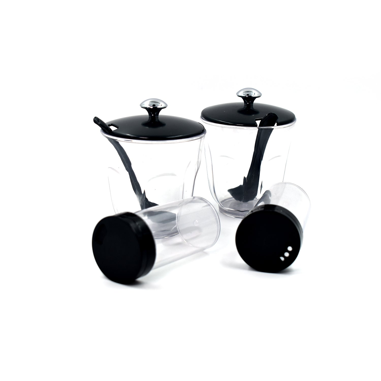 An Indian kitchen countertop featuring the Ganesh Spice Condiment Set for daily cooking.