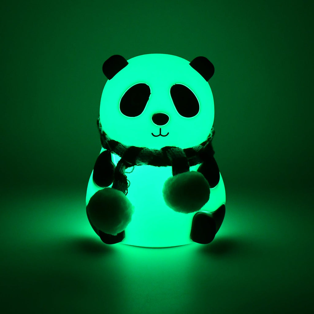 Side view of the charming panda night light, showcasing its smooth silicone texture.