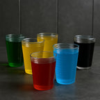 Durable Plastic Ringo Glass placed near snacks for casual home use