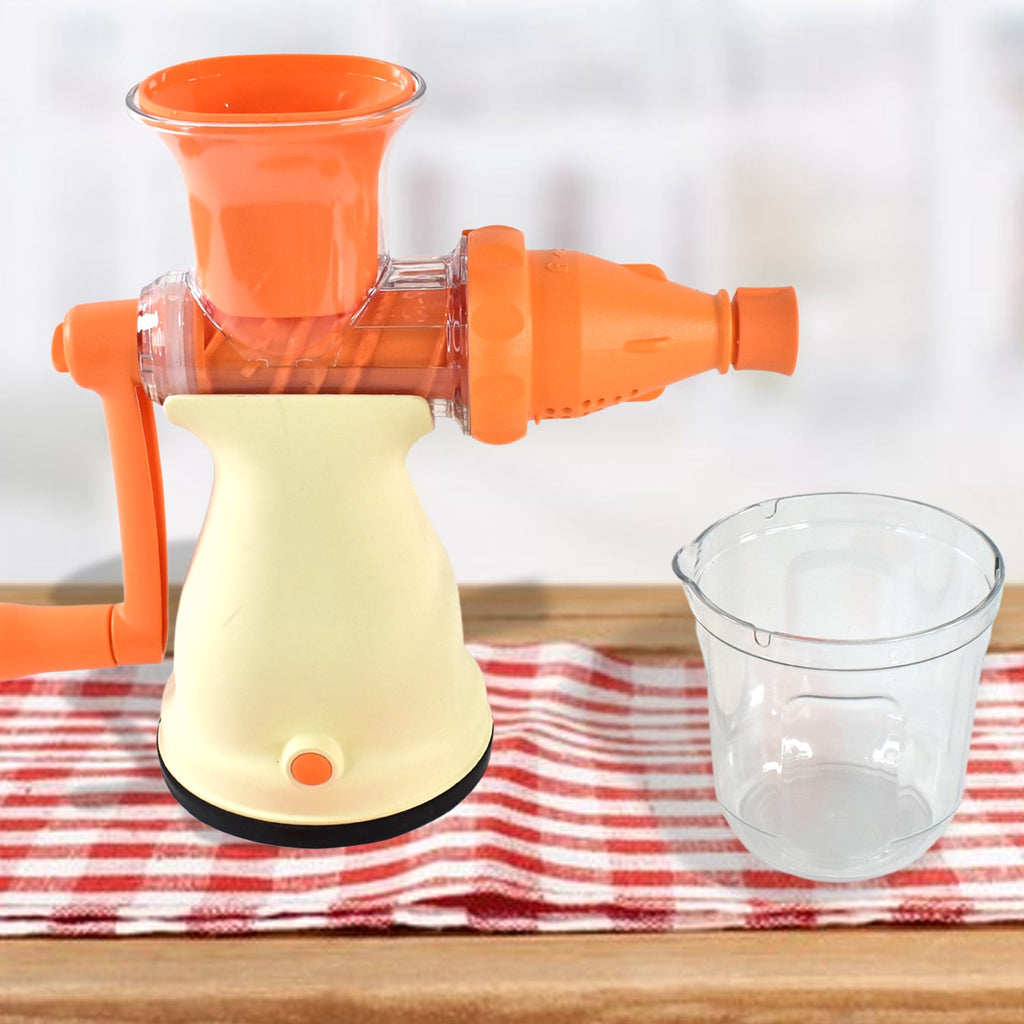 Manual carrot juicer with heavy-duty vacuum base extracting fresh juice
