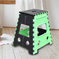 Open 18-inch brown folding stool made of sturdy plastic, ready for use.