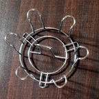 Elegant round glass stand for efficient kitchen storage.