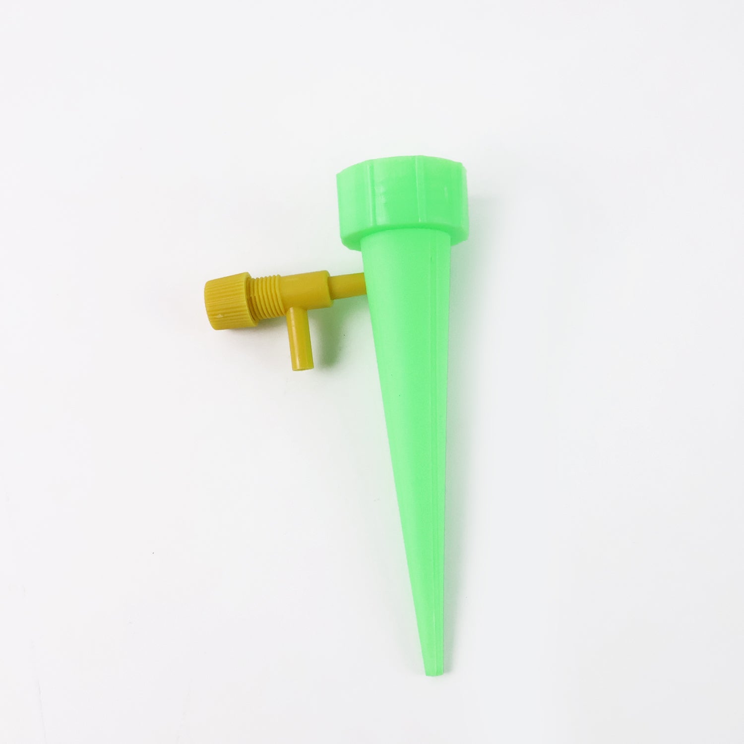 Sprout Spike watering device placed securely in garden soil