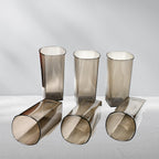 Black plastic glasses for beer and wine, showcasing elegant square shape.