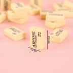 The complete 30-pack of yellow 4B erasers, perfect for bulk stationery needs.