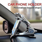 Driver's perspective of the leopard car phone holder providing clear visibility.