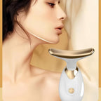 The compact Neck Face Massager held in hand, ready for use anywhere.