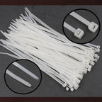 Black 10-inch cable ties from Organivo, shown coiled and ready for diverse applications.