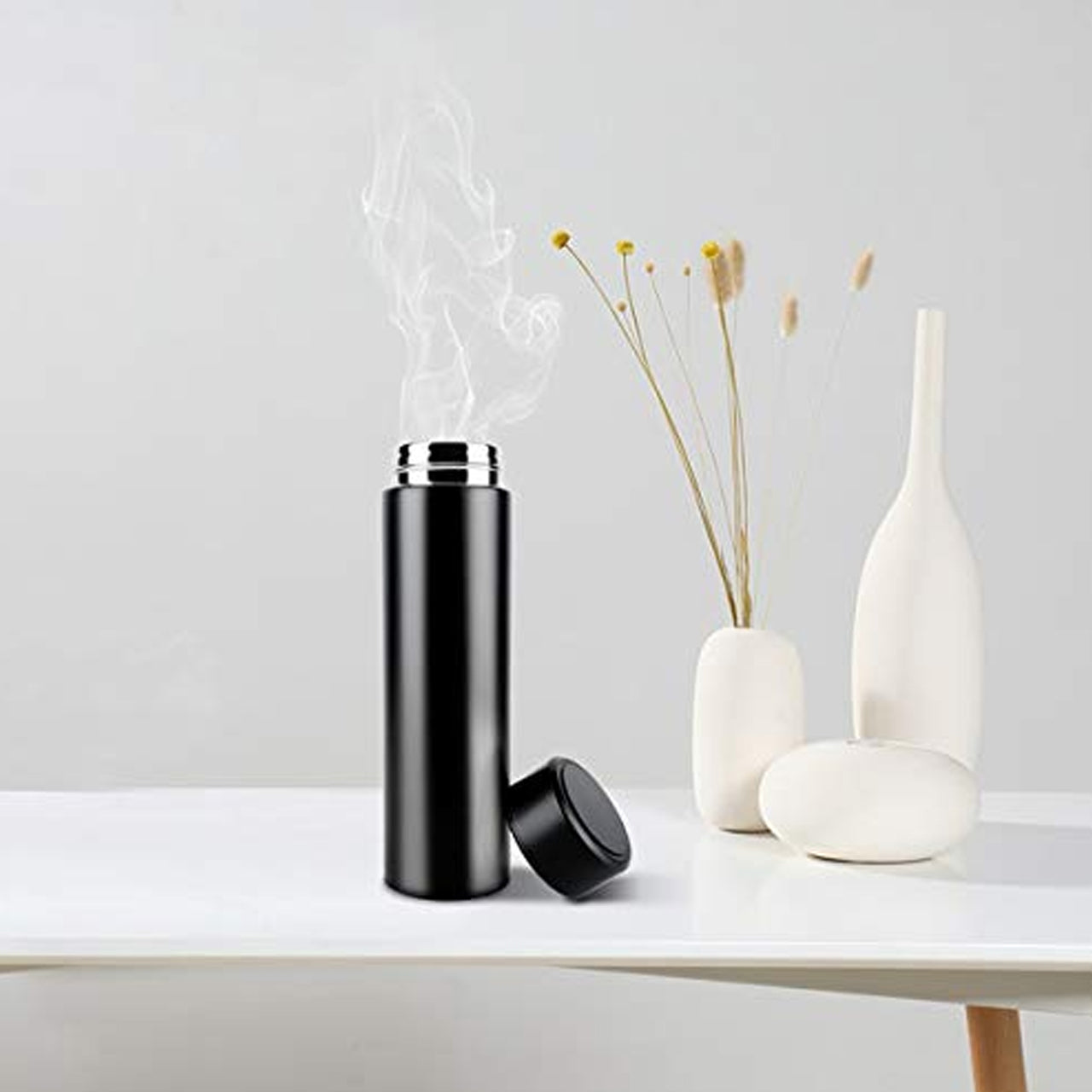 Detailed view of the smart stainless steel flask.