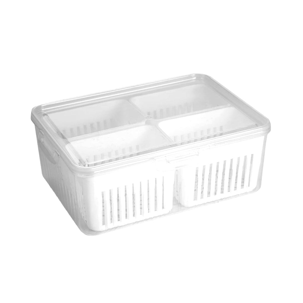 Fresh carrots and other vegetables neatly arranged in a clear fridge organizer box.