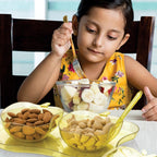 The complete apple shape serving set with all components neatly arranged.
