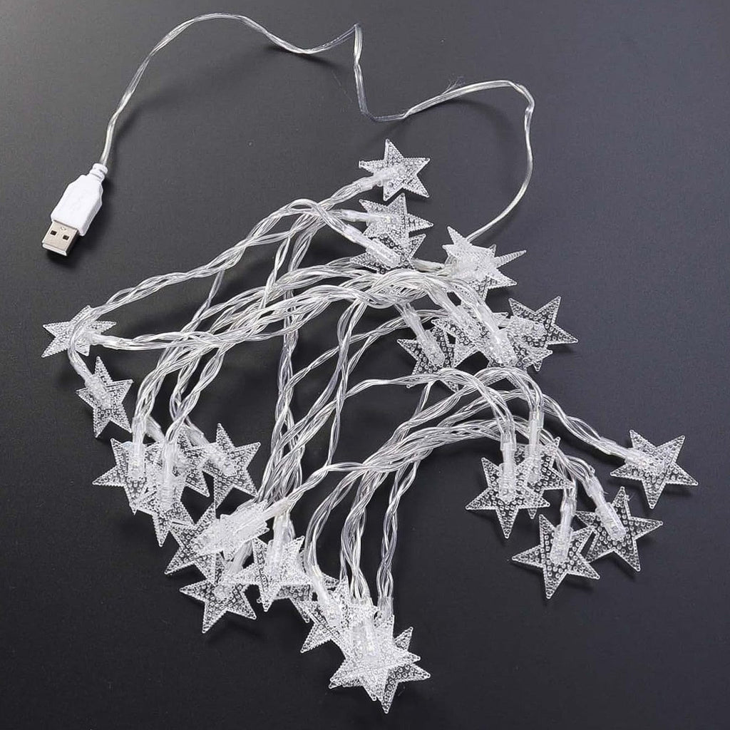 Festive USB powered star string LED lights creating warm ambiance
