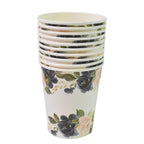 Group of disposable paper cups on a table, suitable for any event.