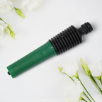 Close-up view of a quick-fit hose fitting adapter from the nozzle set.