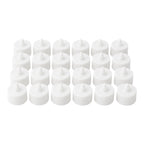 Multiple battery-operated tealights illuminating a dark room.