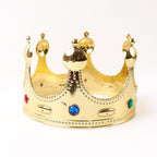 Classic royal gold crown decorated with colored gems