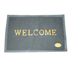 Detail view of the durable, anti-slip backing of the Welcome Door Mat, ensuring safety.