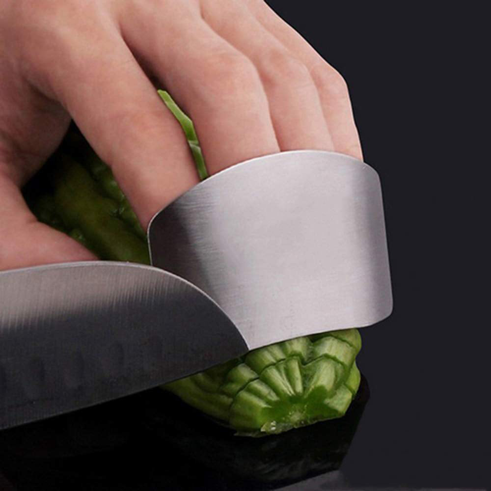 Adjustable stainless steel finger guard, providing a secure fit for safe and precise slicing.