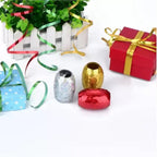 Bright curling ribbons in various colors, perfect for birthday party decor.