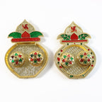 Side view of vibrant Kalash-shaped plastic kumkum box for pooja rituals