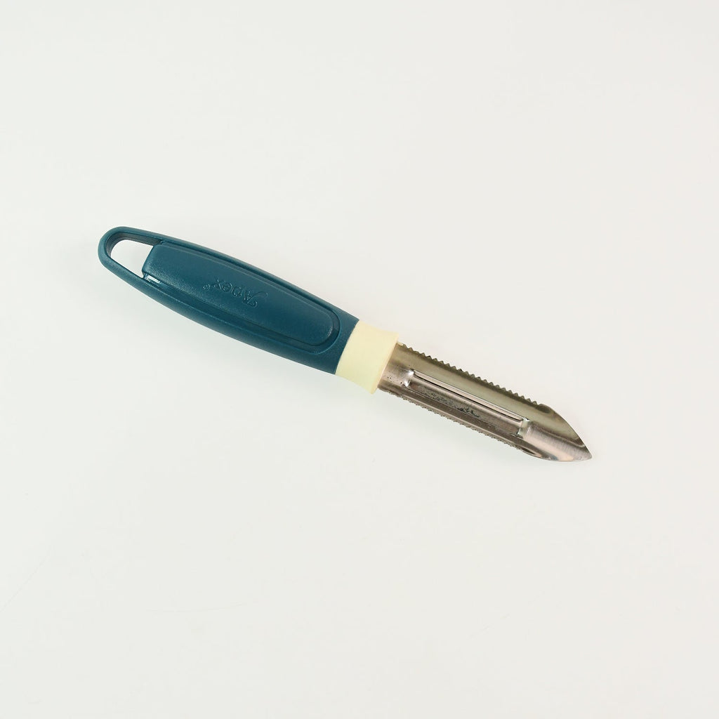 Stacked peel curls created by Apex vegetable peeler's sharp serrated blade