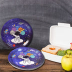 Stack of disposable party plates with 'Happy Cheers' designs, perfect for guests.