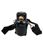 Tumblo Smart Thermos Bottle being used outdoors, ideal for travel and hiking.