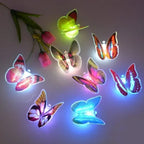 The Butterfly 3D Night Lamp casting beautiful patterns on a wall.