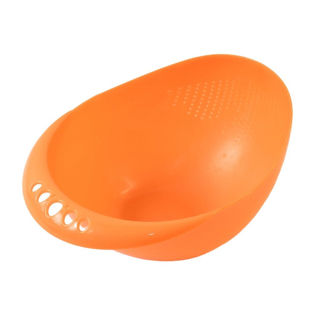 Close-up of the finely designed drainage holes in the plastic washing bowl.