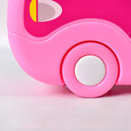 Kids' toy makeup items, including brushes and compacts, arranged neatly.