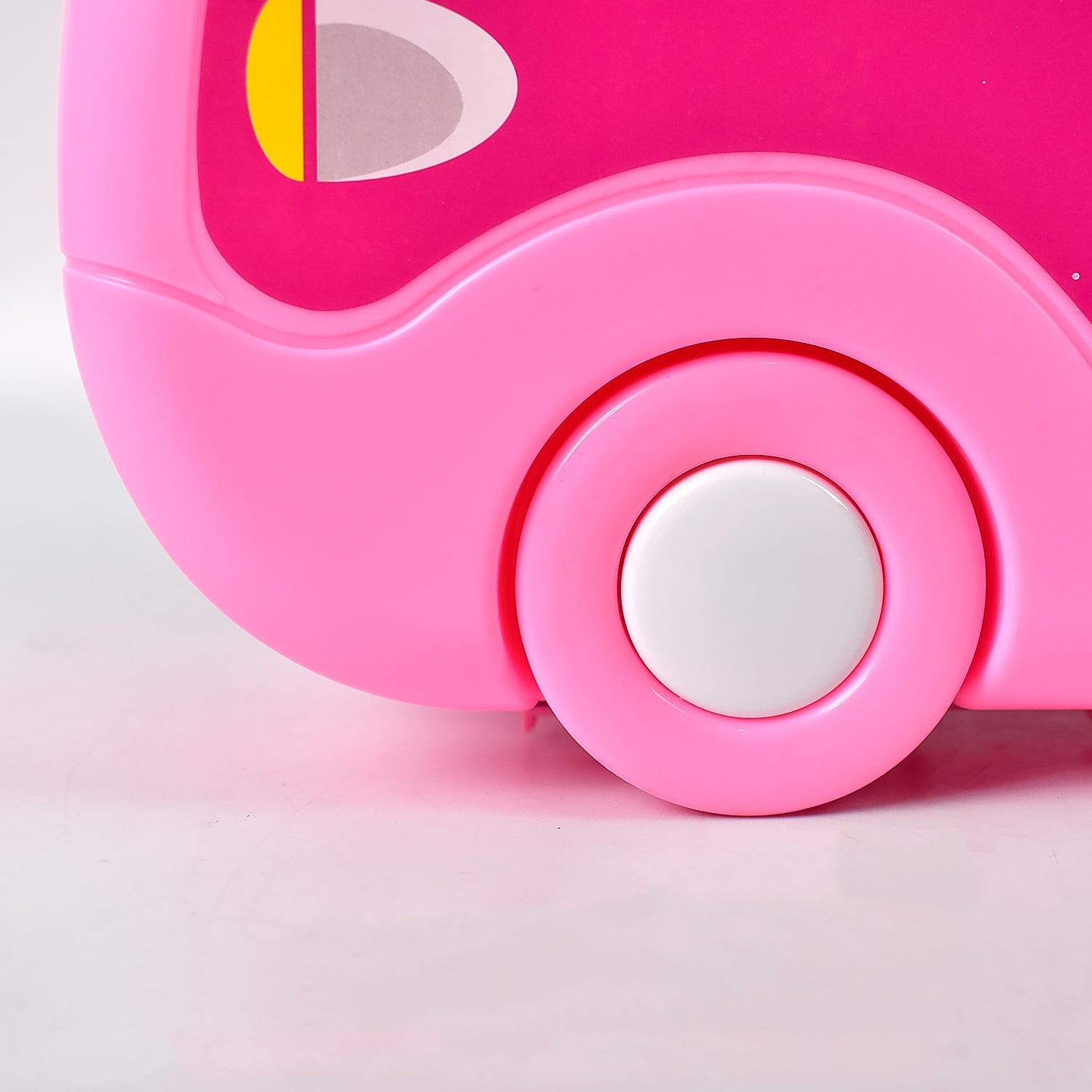 Kids' toy makeup items, including brushes and compacts, arranged neatly.