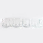 Stackable glass tumblers and mugs, part of a durable and practical drinkware collection.