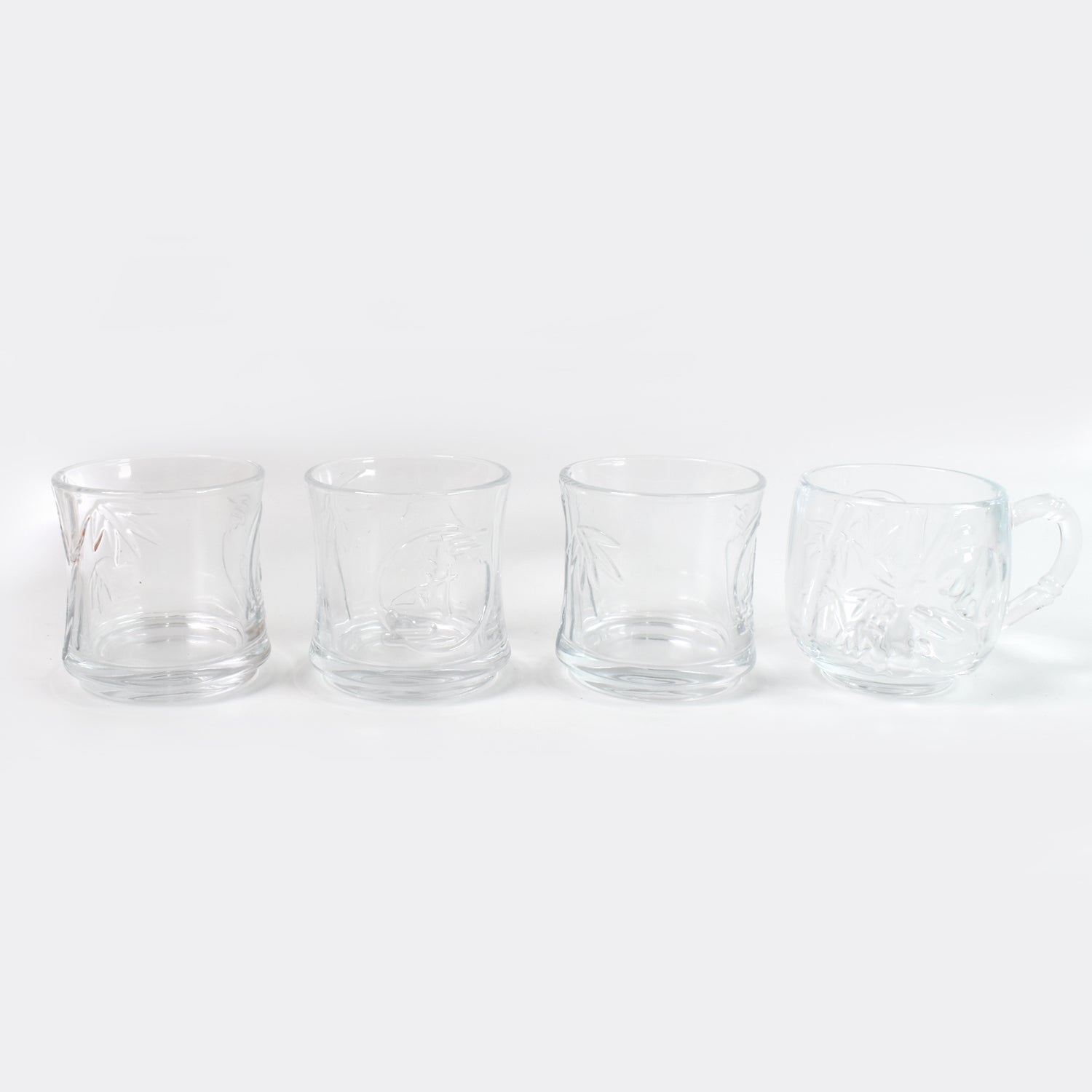 Stackable glass tumblers and mugs, part of a durable and practical drinkware collection.