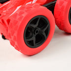 Electroplay remote control stunt car side view highlighting tire details