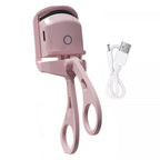Woman using the handheld Electric Heated Eyelash Curler for perfect lashes.