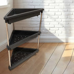 Triangular corner storage rack showing spacious plastic shelves and metal supports