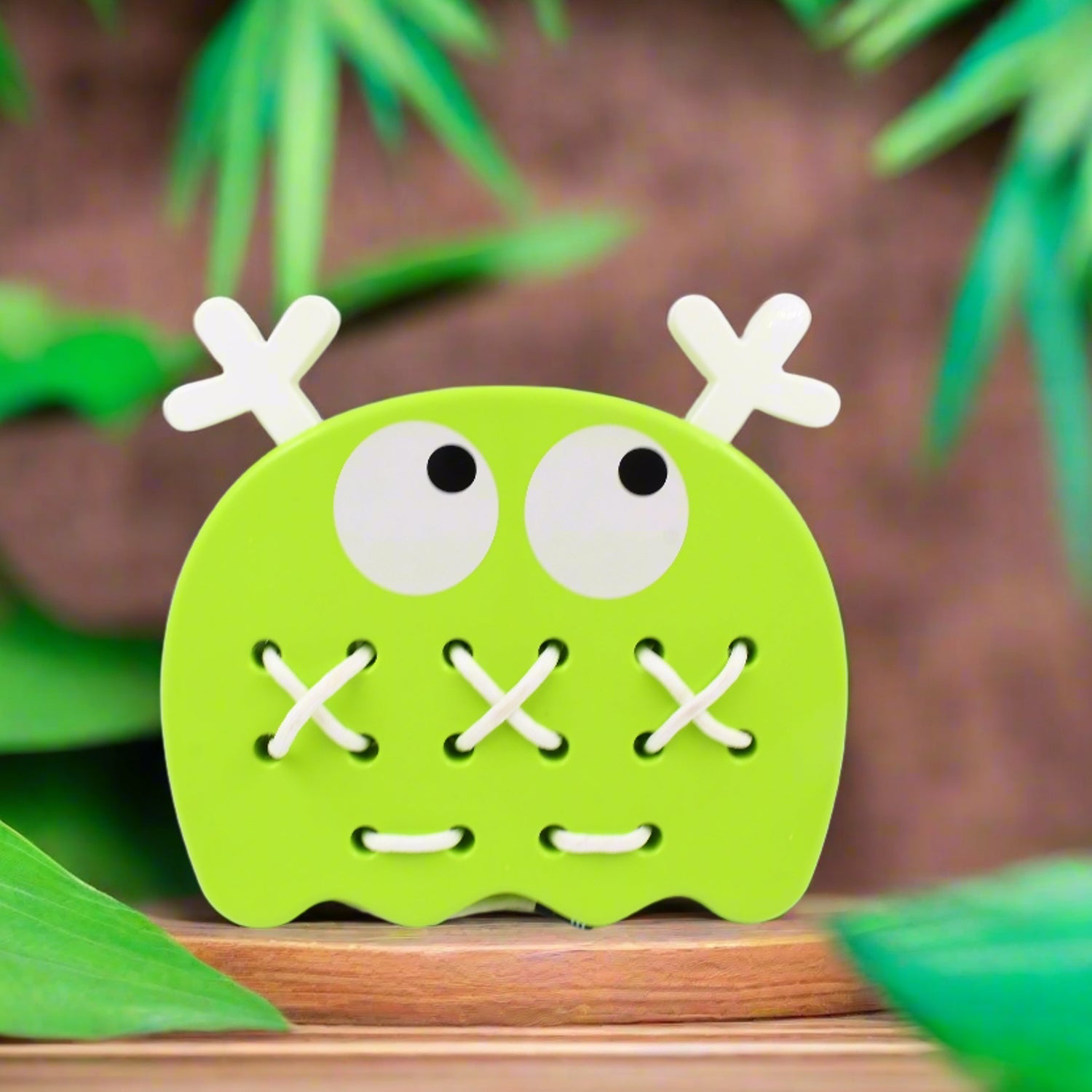 Brightly colored Stitch Mee Puzzle Toy pieces arranged on a plain background.