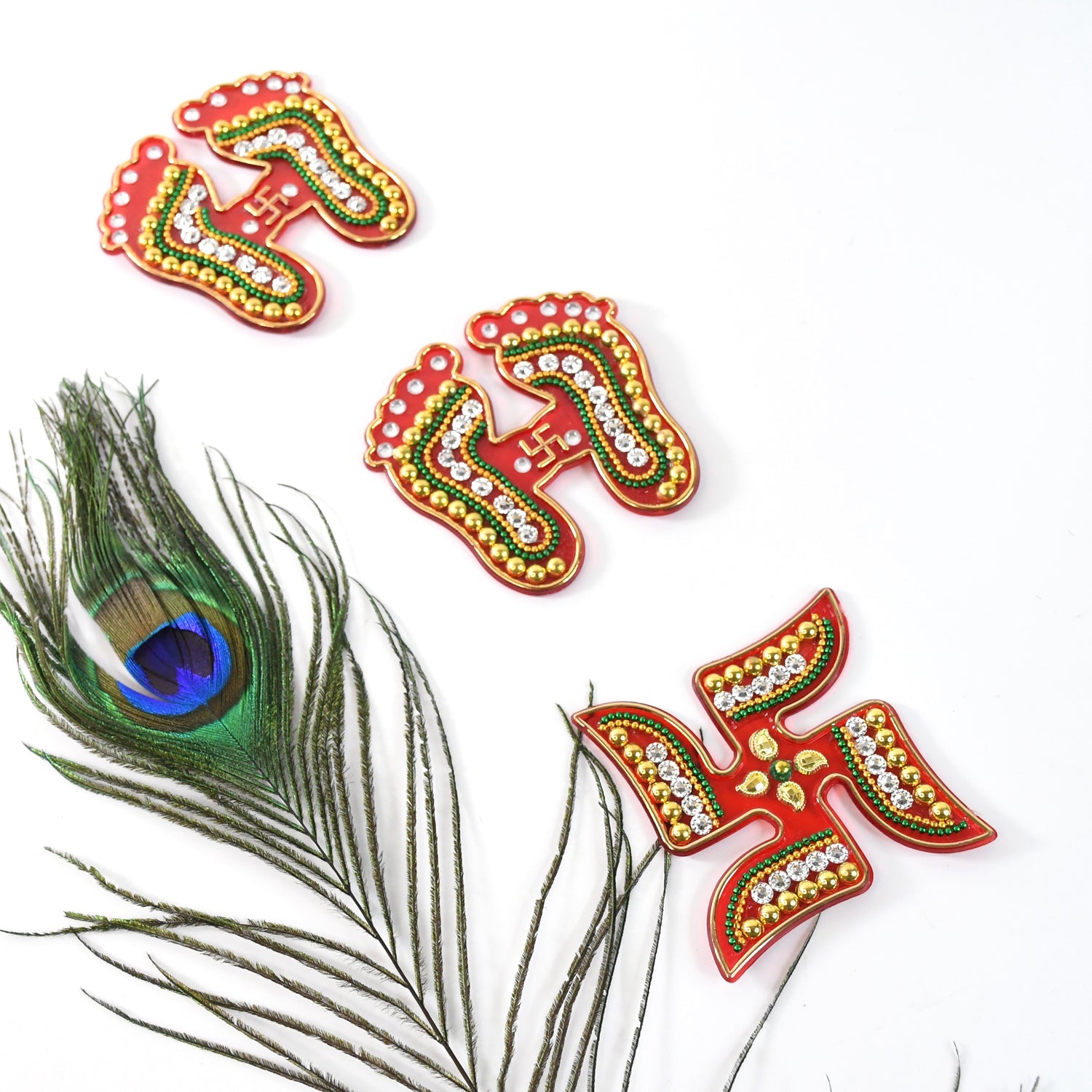 Close-up of Laxmi Charan feet decorative sticker with mirror stones