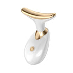 Angled side view of the Velvet Wellness Neck Face Massager, highlighting its contours.