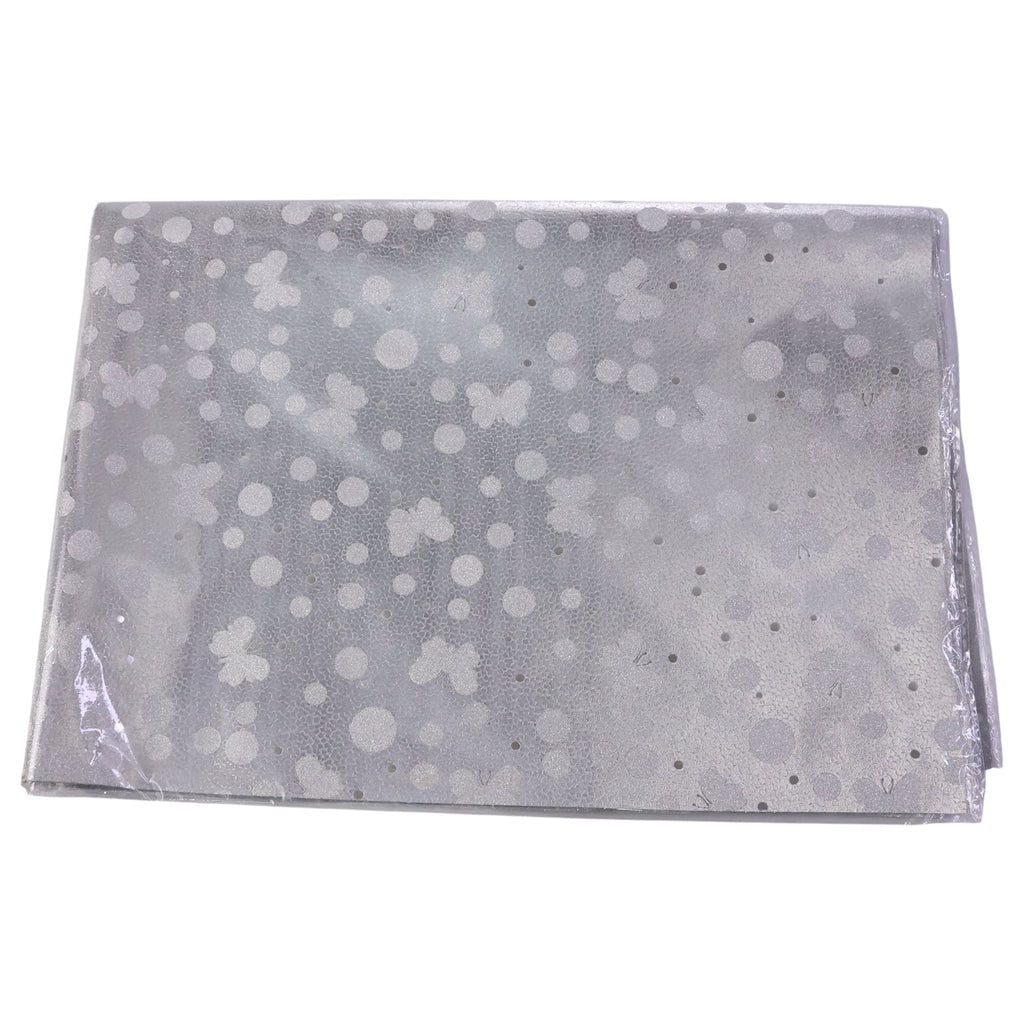 Premium quality silver gift wrapping paper sheets stacked neatly