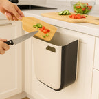 Detailed view of the fastening ring and hanging mechanism of the collapsible dustbin.