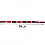 Detailed view of traditional Rakhi with bead work