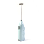 Portable electric milk whisk frothing milk for coffee