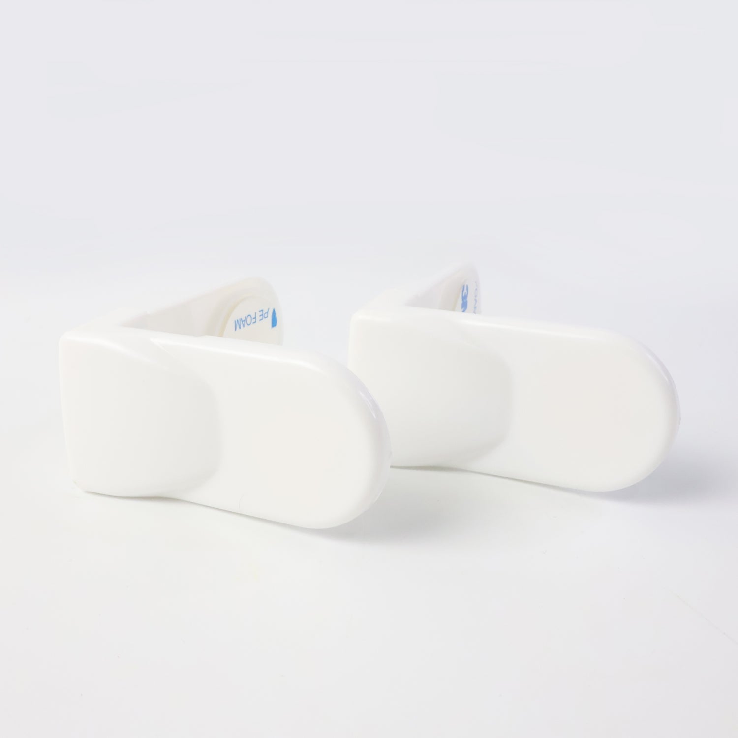 Childproof lock securing cabinet doors from toddlers