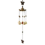 Vibrant outdoor wind bell chime hanging on porch hook