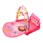 Toddler sitting and playing with the hanging toys on the Aditi baby fitness rack.