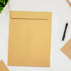 Brown kraft envelopes suitable for various cards and invitations, displayed on a textured background.
