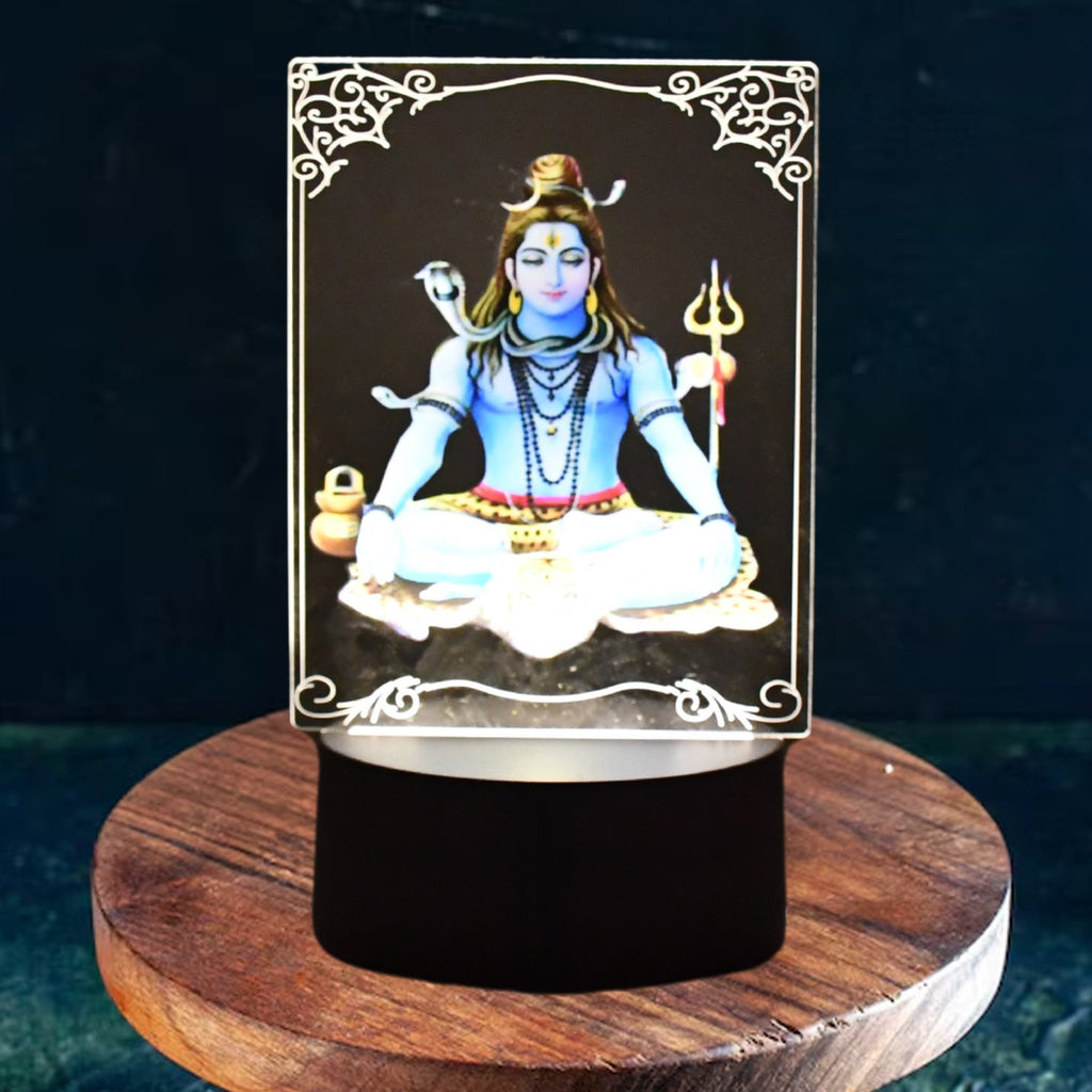 Lord Shiva 3D LED Frame glowing with soft warm white light in a dark room